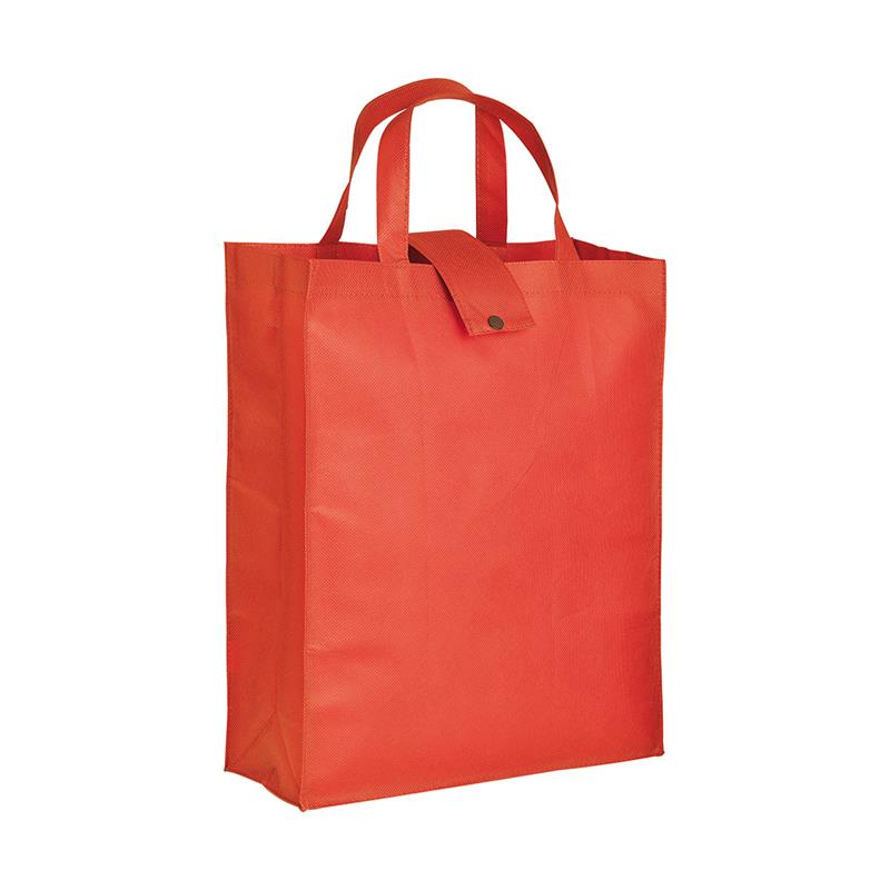 shopper pieghevole in tnt rosso con soffietti e manici tnt